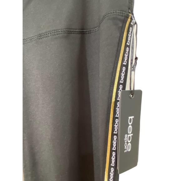 Bebe leggings with gold striping down legs classic Bebe logo repeated - Picture 5 of 9